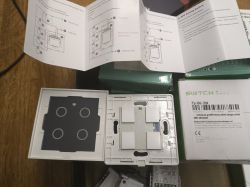 Box with touch switch components and instruction manual.