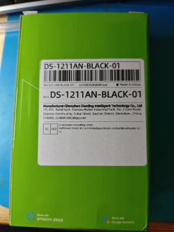 Green box with product label DS-1211AN-BLACK-01 and barcode