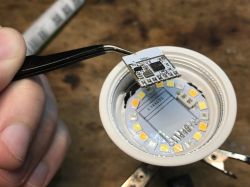 Dismantled GU10 Bulb with WiFi Board WiFi board with LED module extracted from the GU10 bulb housing.