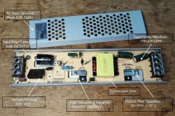 LED power supply with open case and labeled electronic components