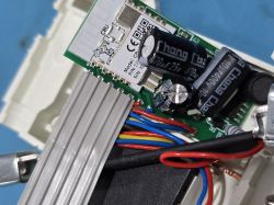 Close-up of an electronic module labeled CBU with visible wiring.