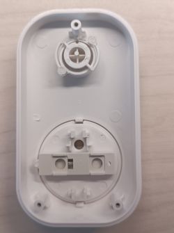 Interior of SP400W-IL Plug Interior of SP400W-IL plug casing showing mounting plate and screw holes.
