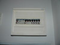 High-Pitched Sound from Fuse Box when 3.5 kW Air Conditioner is On in a 12.5 kW Apartment