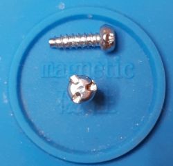 Specialized Tri-point Screws on Magnetic Mat Close-up of specialized Tri-point screws on a blue magnetic mat.