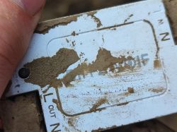 Flood-Damaged WiFi Relay BW-SS1 Dirty WiFi relay BW-SS1 with visible sand and soil residue.