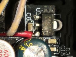 Close-up of a prototype board with visible electronic components and connected wires.