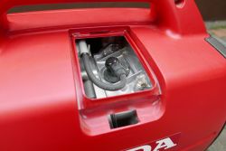 Close-Up View of Honda EU22i Generator Service Cover Close-up view of the service cover on the Honda EU22i generator.