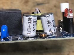 Moes MS-103 Kit: Relay, Probe, and Manual Programmable dual Moes MS-103 relay, temperature sensor, and user manual on a white table.
