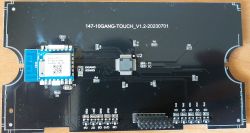 Touch switch PCB with ESP module and integrated circuit.