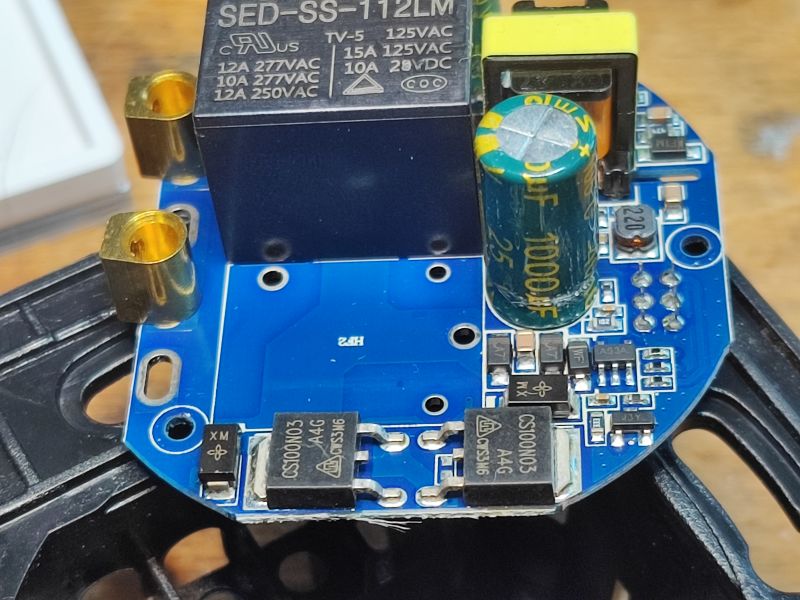 Circuit Board with SED-SS-112LM Relay Circuit board with electronic components, including a SED-SS-112LM relay and a capacitor.