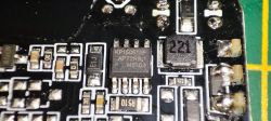Close-up of PCB with KP16051SF Chip Close-up of a PCB with various electronic components, including a KP16051SF chip.