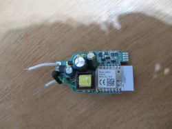 Electronic module with components on wooden background