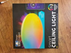 Packaging of LSC smart ceiling light with colorful gradient illustration