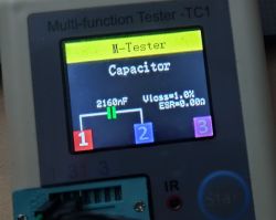 M-Tester screen showing a capacitor measurement of 2160 nF with Vloss 1.0%