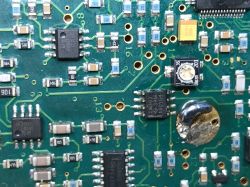 The interior of a damaged PCB from a metal detector.