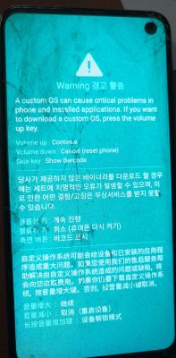 Ekran trybu ostrzegawczego Samsung, informacja o niestandardowym systemie operacyjnym