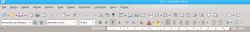 Zrzut ekranu LibreOffice Writer na Debianie z KDE, pokazujący pasek narzędzi i ustawienia.