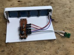 DIY Clock Prototype with Electronic Components Interior of DIY clock prototype with PCB and electronic components