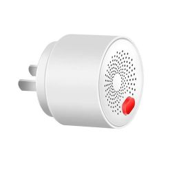 Plug-in combustible gas alarm with a red button.