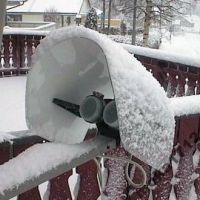 Effectiveness of Dedicated Converter Cover Against Signal Loss During Heavy Rainfall