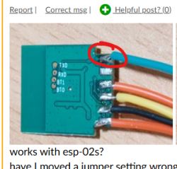Close-up of a PCB with soldered wires.
