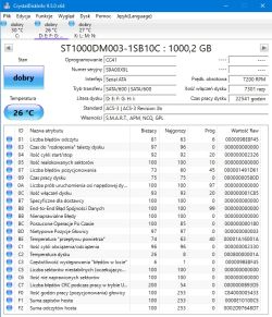 Zrzut ekranu z CrystalDiskInfo pokazujący szczegóły dysku twardego ST1000DM003.