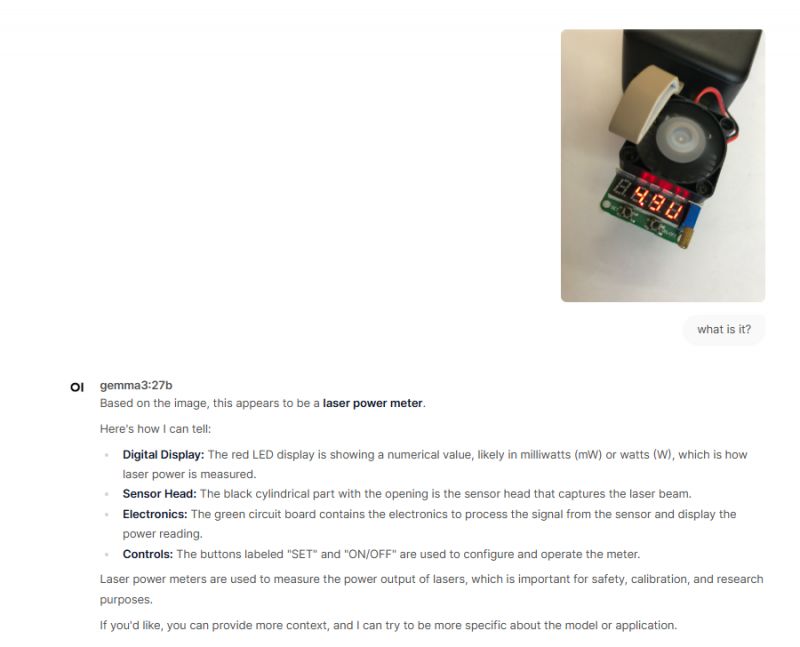 Laser Power Meter with LED Display Device with LED display and cylindrical sensor, described as a laser power meter.