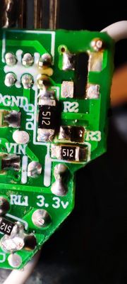 PCB with Electronic Components Close-up of a PCB with labels and electronic components.