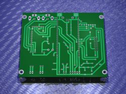 Single-sided PCB with visible traces and mounting holes.