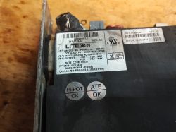 Zbliżenie na tabliczkę znamionową zasilacza Lite-On model PA-2461-1A o mocy 465 W.