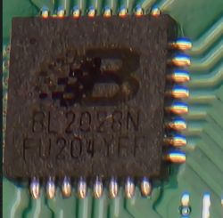 Microchip labeled BL2028N on a circuit board.