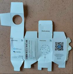Tuya 20A Smart Plug Packaging Unfolded packaging of a smart plug.