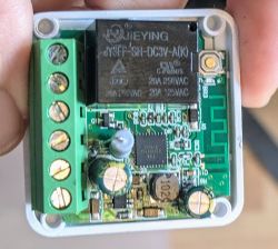 Interior of an electrical switch with visible electronic components.
