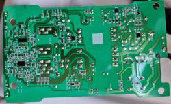 Close-up view of a circuit board interior with various electronic components.