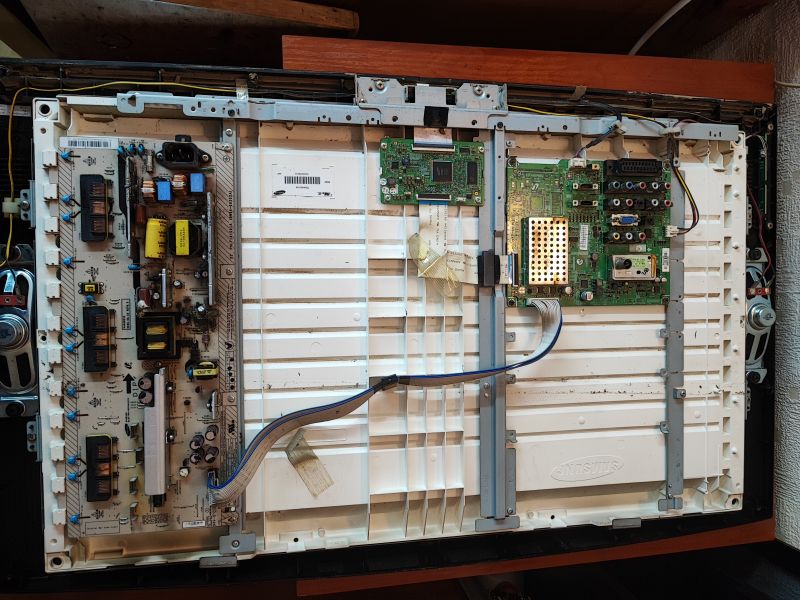 Interior of a Flood-Damaged Samsung LE32A330J1N TV Interior of a Samsung LE32A330J1N TV with visible flood damage.