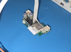 Electronic module with ESP8266 chip, connectors, and capacitors