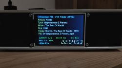 Audio player screen displaying MP3 track info and playback time