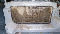 Dirty condenser from a washing machine with a self-cleaning system after intensive use.