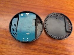 S01 Pro with Open Case Open S01 Pro device on a wooden table with visible PCB.