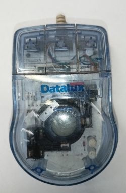 Transparent Datalux computer mouse with visible internal components.