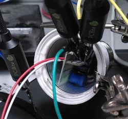 LSC Smart Connect Bulb Teardown Teardown of LSC Smart Connect bulb with connected wires and PCBite probes