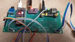 Close-up of a prototype board with various connected electronic modules.