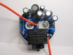Electronic Circuit Board with Components Electronic circuit board with components and red wires.
