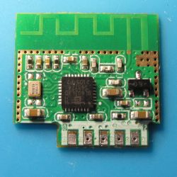 IoT Module with BL602 Chip IoT module with visible electronic components and a BL602 chip on a blue background.