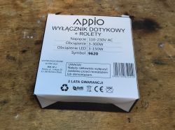 Appio 9620 Switch Packaging Appio 9620 touch switch packaging on a wooden table