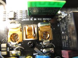Interior of IoT Module with Components Close-up of the interior of an IoT module with visible components and connectors.