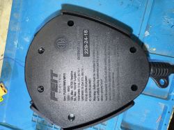 Underside of Feit PLUG3/WIFI/WP/2 Device View of the underside of the Feit PLUG3/WIFI/WP/2 device with visible markings and certifications.