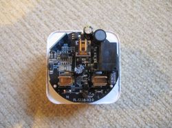 Interior of a Smart Plug with FL-S138-V2.0 Board Close-up of the interior of a smart plug with the FL-S138-V2.0 board.