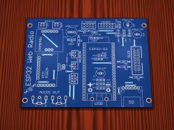 3D render of a blue “ESP32 Web Radio” PCB with labeled connectors and module footprints