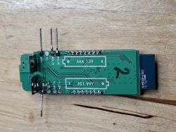 Printed circuit board with AAA 1.5V markings and pin headers